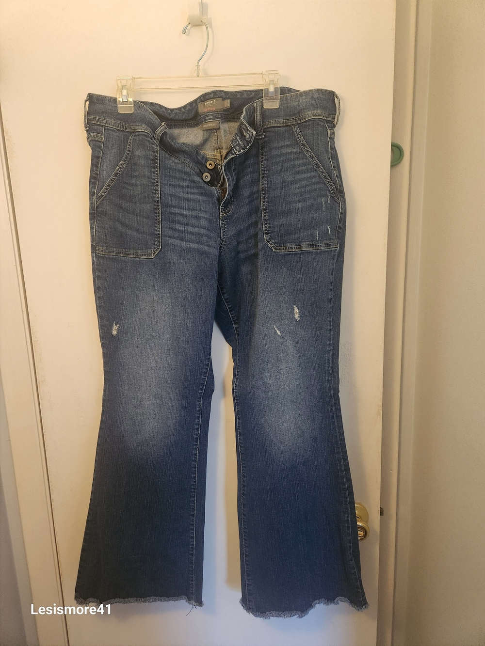 torrid Medium Wash Distressed Flared Jeans